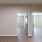 a room with a door and a window