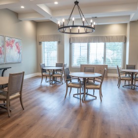 an activity room with windows