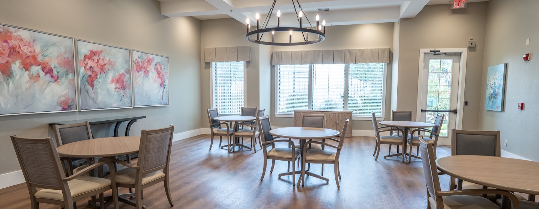 a spacious dining hall with many tables
