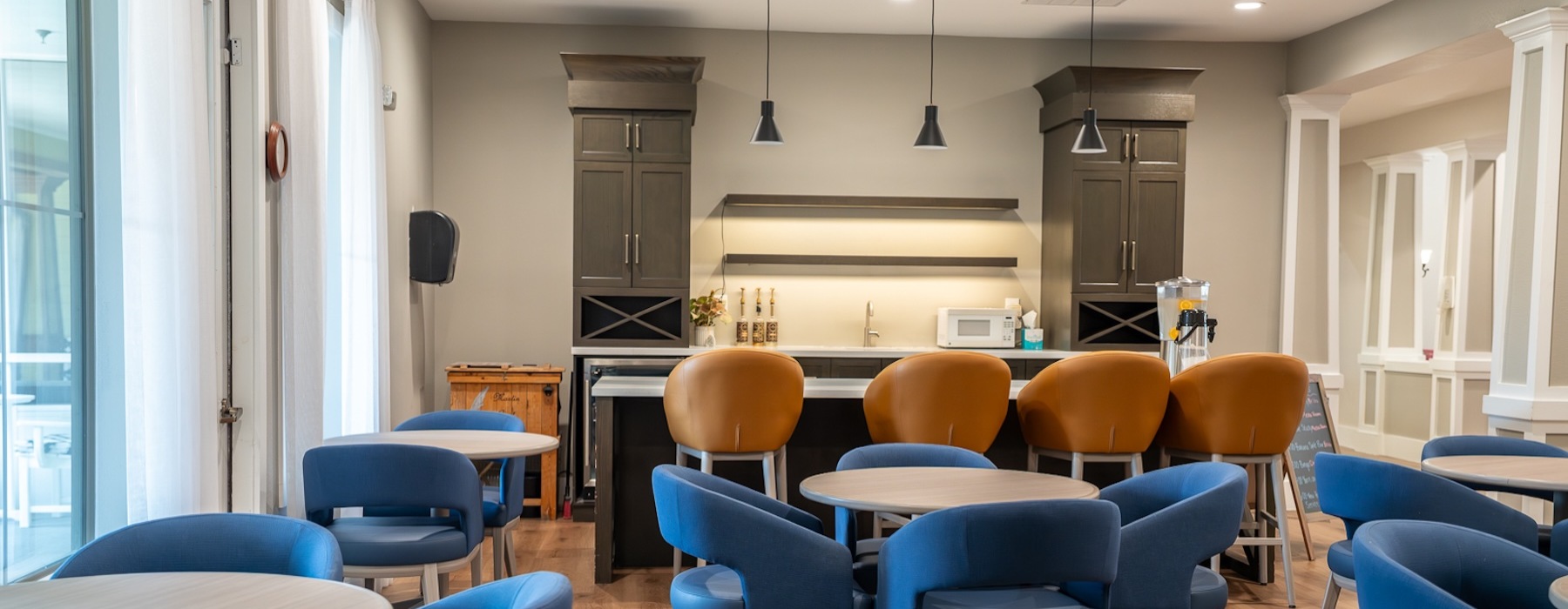 a spacious resident kitchen with a large island