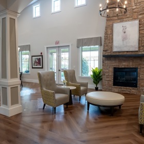 a spacious lounge and fireplace