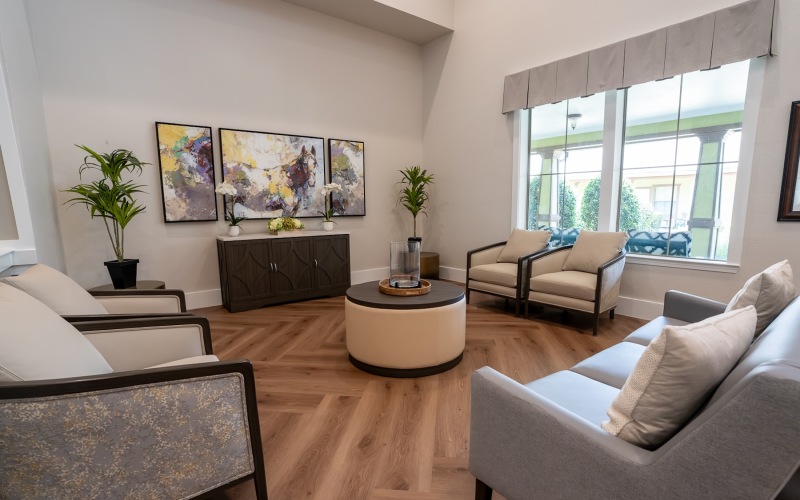 a large room with white furniture