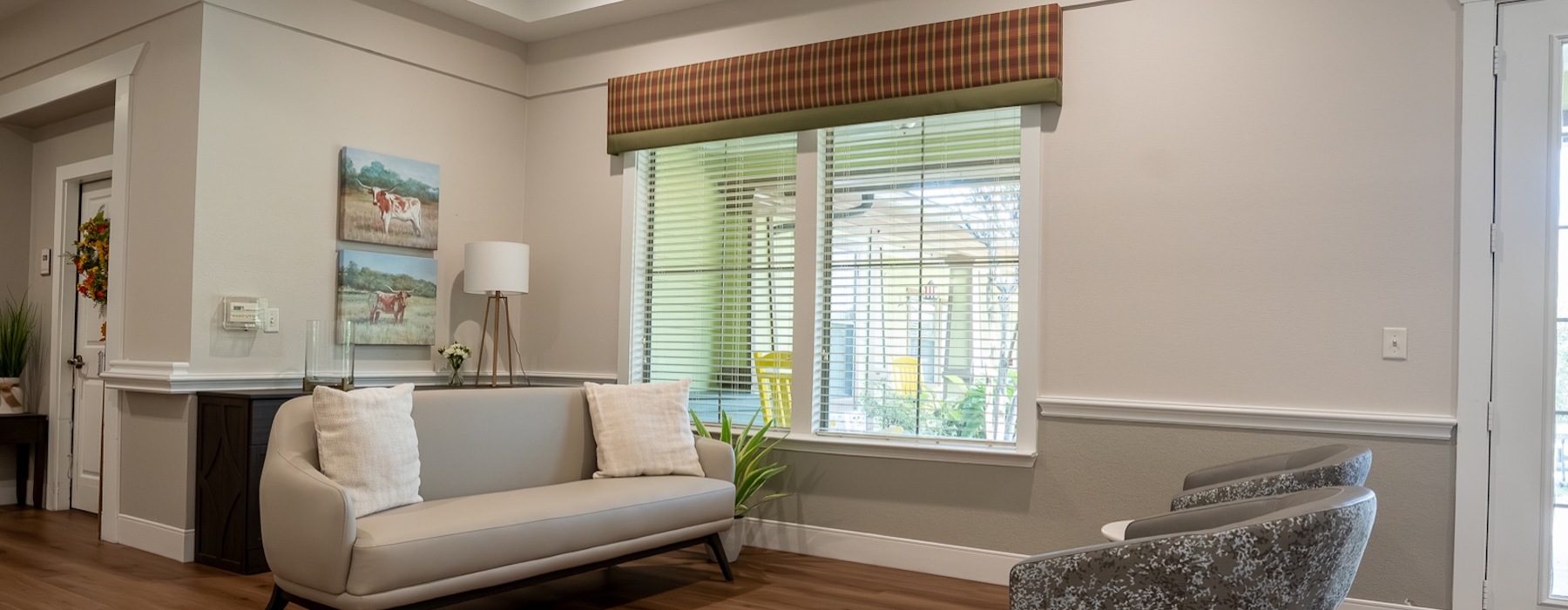 a spacious room with ample lighting